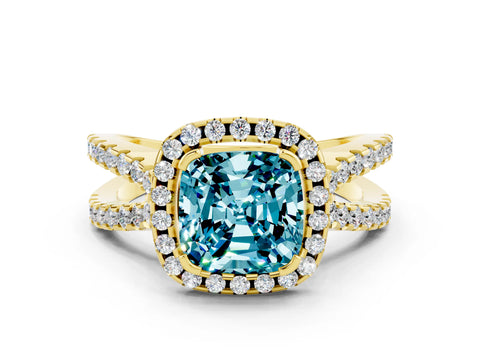 Yellow gold Cushion Cut Blue Topaz Halo Ring with Split Shank Pavé Band and Prong Setting