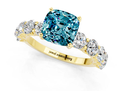 Yellow gold Cushion Cut Blue Topaz Prong Setting with Side Stones on a Pave Band_1