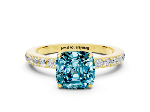 Yellow gold Cushion Cut Blue Topaz Ring with Pavé Band and Four-Prong Setting