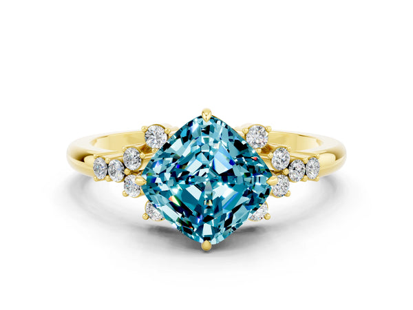 Yellow gold Cushion Cut Blue Topaz Ring with Side Stones and Four-Prong Setting