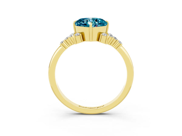 Yellow gold Cushion Cut Blue Topaz Ring with Side Stones and Four-Prong Setting