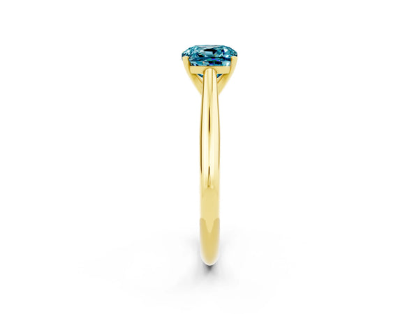 Yellow gold Cushion Cut Blue Topaz Solitaire Engagement Ring with Cathedral Setting and Four-Prong Mount