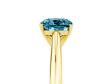 Yellow gold Cushion Cut Blue Topaz Solitaire Engagement Ring with Cathedral Setting and Four-Prong Mount_29