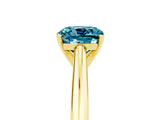 Yellow gold Cushion Cut Blue Topaz Solitaire Engagement Ring with Cathedral Setting and Four-Prong Mount_83