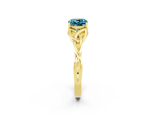 Yellow gold Cushion Cut Blue Topaz Solitaire Engagement Ring with Celtic Knot Band and Four-Prong Setting