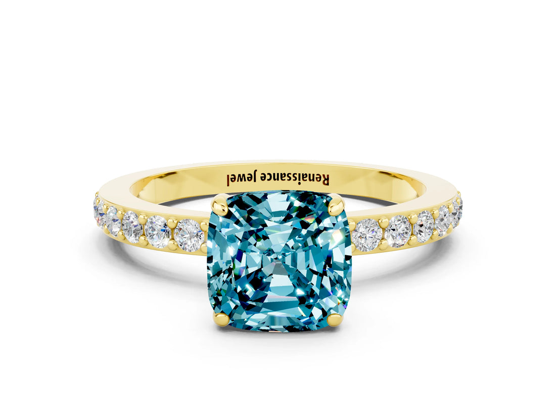 Yellow gold Cushion Cut Blue Topaz Solitaire Engagement Ring with Pavé Band and Four-Prong Setting
