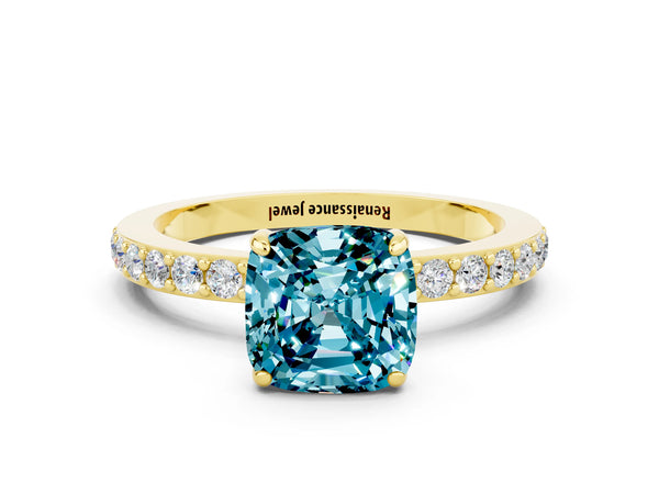 Yellow gold Cushion Cut Blue Topaz Solitaire Engagement Ring with Pavé Band and Four-Prong Setting