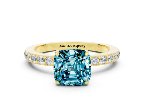 Yellow gold Cushion Cut Blue Topaz Solitaire Engagement Ring with Pavé Band and Four-Prong Setting