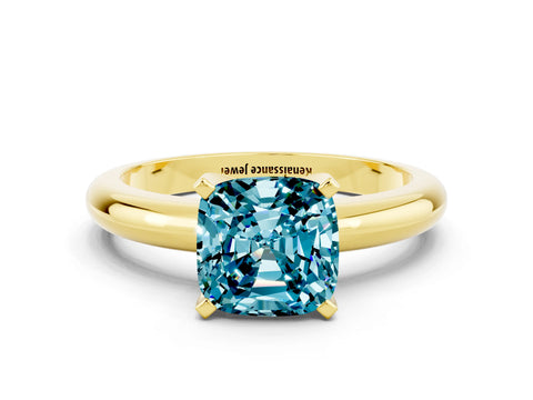 Yellow gold Cushion Cut Blue Topaz Solitaire Engagement Ring with Round Band and Four-Prong Setting