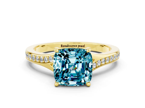 Yellow gold Cushion Cut Blue Topaz Solitaire Ring with Pavé Band and Prong Setting