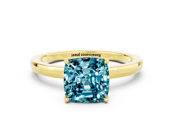 Yellow gold Cushion Cut Blue Topaz Solitaire Ring with Thin Band and Prong Setting
