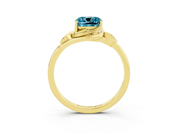 Yellow gold Cushion Cut Blue Topaz Solitaire Ring with Twist Band and Four-Prong Setting