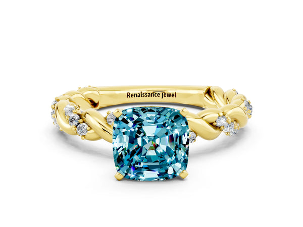 Yellow gold Cushion Cut Blue Topaz Solitaire Ring with Twisted Band and Pavé Accents