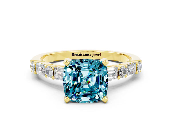 Yellow gold Cushion Cut Blue Topaz Solitaire with Side Baguettes and Channel Set Band