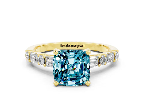 Yellow gold Cushion Cut Blue Topaz Solitaire with Side Baguettes and Channel Set Band