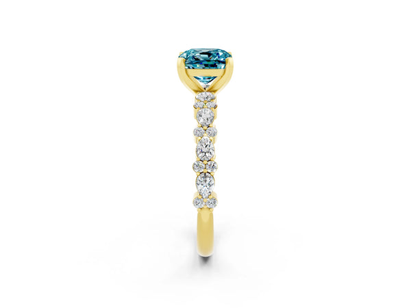 Yellow gold Cushion Cut Blue Topaz Side Stone Solitaire Ring with Round  and Four-Prong Setting