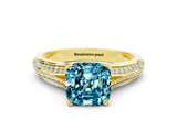 Yellow gold Cushion Cut Blue Topaz Split Shank Engagement Ring with Pavé Band
