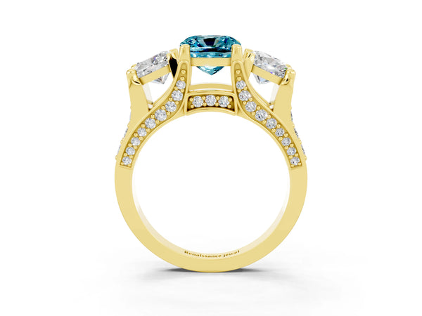 Yellow gold Cushion Cut Blue Topaz Three-Stone Ring with Channel Set Band and Four-Prong Setting