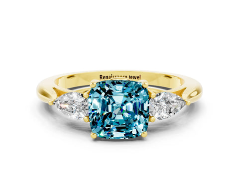 Yellow gold Cushion Cut Blue Topaz Three-Stone Ring with Pear Side Stones and Four-Prong Setting_12