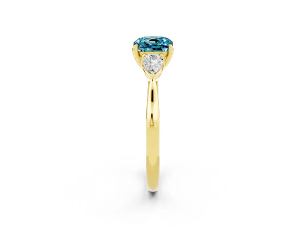 Yellow gold Cushion Cut Blue Topaz Three-Stone Ring with Pear  Side Stones and Prong Setting