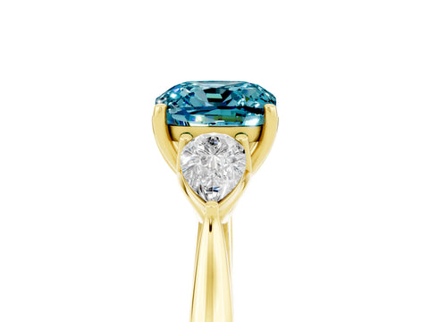Yellow gold Cushion Cut Blue Topaz Three-Stone Ring with Pear Side Stones and Four-Prong Setting_17