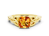 Yellow gold Cushion Cut Citrine Solitaire Engagement Ring with Celtic Knot Band and Four-Prong Setting