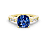 Yellow gold Cushion Cut Cut Channel Set Solitaire Engagement Ring with Four-Prong Setting