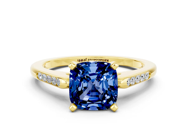 Yellow gold Cushion Cut Blue Sapphire Solitaire Ring with Channel Set Round  Band and Prong Setting