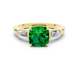 Yellow gold Cushion Cut Cut Diamond Ring with Tapered Baguette Side Stones in Four-Prong Setting
