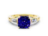 Yellow gold Cushion Cut Cut Diamond Ring with Tapered Baguette Side Stones in Four-Prong Setting