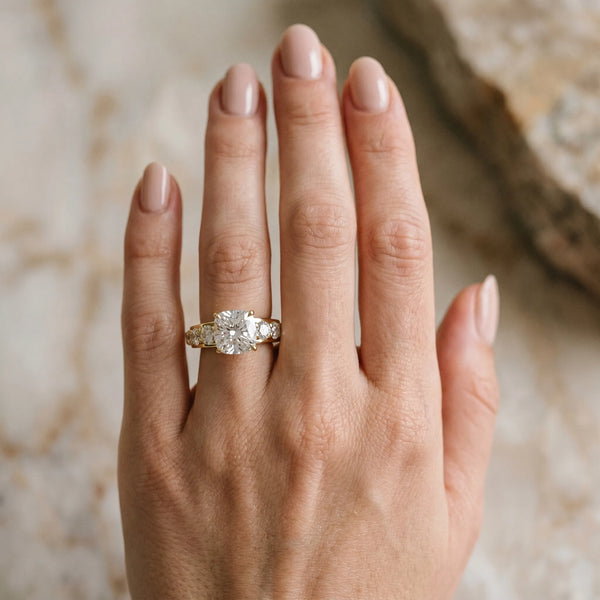 Yellow gold Cushion Cut Diamond Engagement Ring with Pavé Band and Four-Prong Setting
