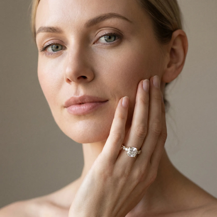 Yellow gold Cushion Cut Diamond Engagement Ring with Pavé Band and Four-Prong Setting
