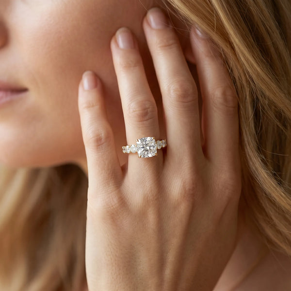 Yellow gold Cushion Cut Diamond Engagement Ring with Pavé Band and Four-Prong Setting