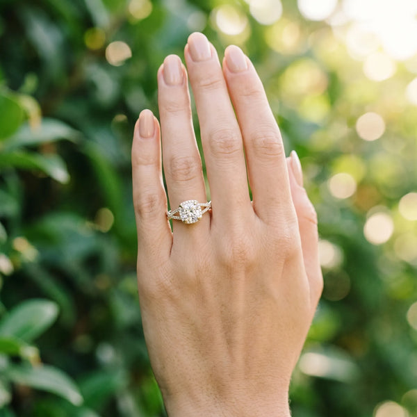 Yellow gold Cushion Cut Diamond Halo Engagement Ring with Twisted Split Shank Pavé Band