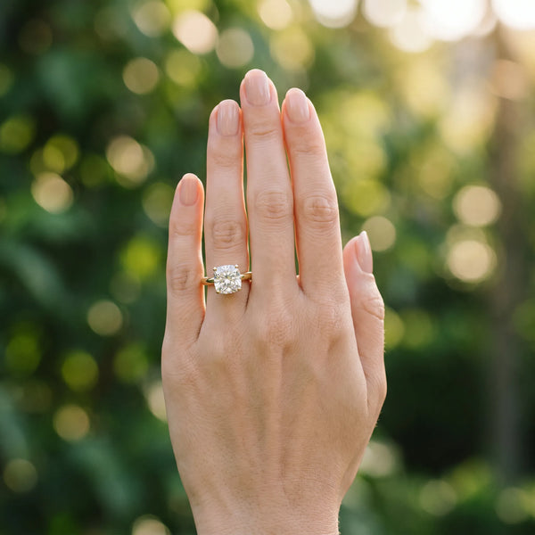 Yellow gold Cushion Cut Diamond Solitaire Engagement Ring with Round Band and Four-Prong Setting