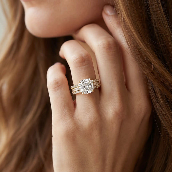 Yellow gold Cushion Cut Diamond Solitaire Ring with Pavé and Channel Set Band