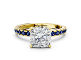 Yellow gold Cushion Cut Diamond Solitaire Ring with Round with Blue Sapphire side stone Pavé Band and Four-Prong Setting_36