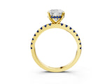 Yellow gold Cushion Cut Diamond Solitaire Ring with Round with Blue Sapphire side stone Pavé Band and Four-Prong Setting_39