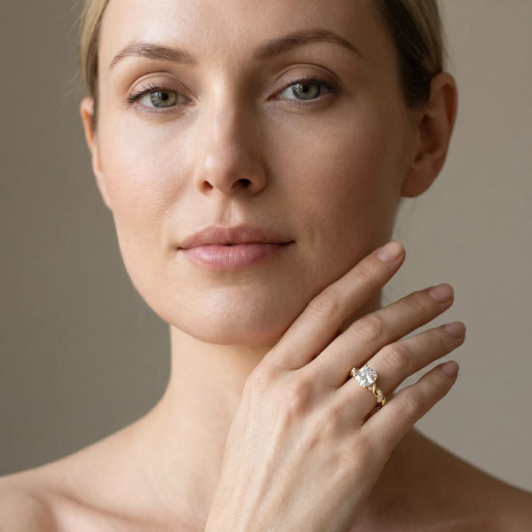 Yellow gold Cushion Cut Diamond Solitaire Ring with Twisted Band and Pavé Accents
