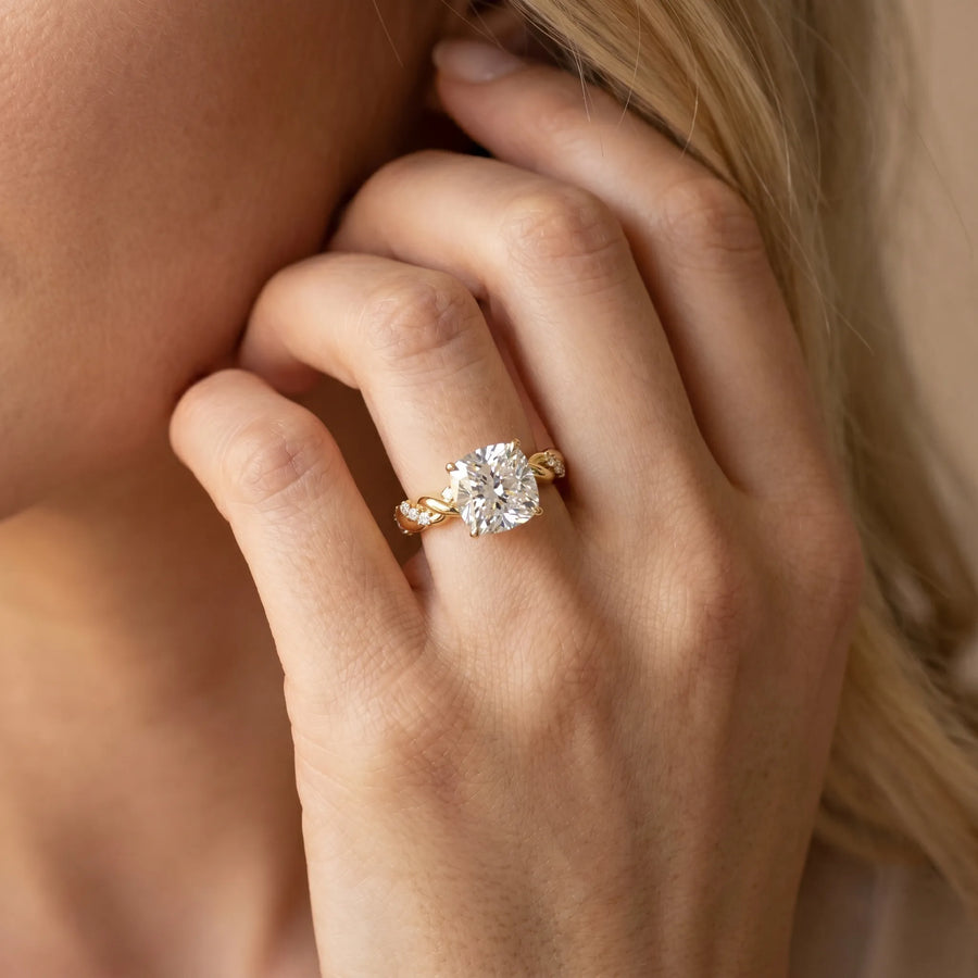 Yellow gold Cushion Cut Diamond Solitaire Ring with Twisted Band and Pavé Accents
