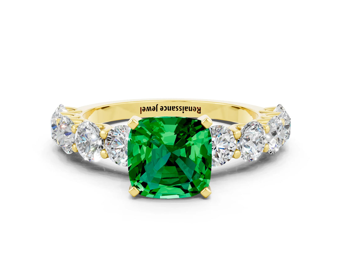 Yellow gold Cushion Cut Emerald Prong Setting with Side Stones on a Pave Band
