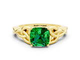 Yellow gold Cushion Cut Emerald Solitaire Engagement Ring with Celtic Knot Band and Four-Prong Setting