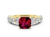 Yellow gold Cushion Cut Garnet Prong Setting with Side Stones on a Pave Band