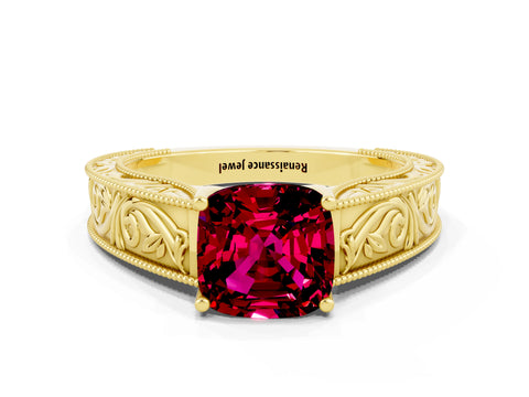 Yellow gold Cushion Cut Garnet Solitaire Ring with Engraved Band and Four-Prong Setting