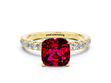 Yellow gold Cushion Cut Garnet Solitaire Ring with Pavé Accents and Four-Prong Setting