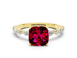 Yellow gold Cushion Cut Garnet Solitaire with Side Stones on a Pavé Band and Four-Prong Setting