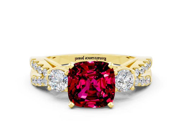 Yellow gold Cushion Cut Garnet Three-Stone Ring with Pavé Split Shank and Four-Prong Setting