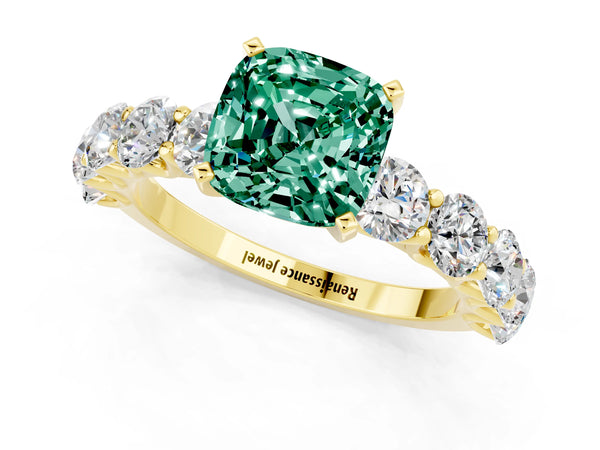 Yellow gold Cushion Cut Green Sapphire Prong Setting with Side Stones on a Pave Band