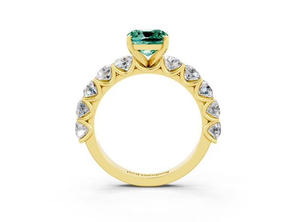 Yellow gold Cushion Cut Green Sapphire Prong Setting with Side Stones on a Pave Band