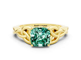 Yellow gold Cushion Cut Green Sapphire Solitaire Engagement Ring with Celtic Knot Band and Four-Prong Setting